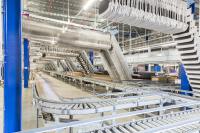 Gigaton bindet Taschensorter für Textilindustrie an