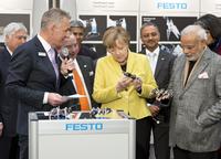Federal Chancellor Dr. Angela Merkel visits the Festo stand