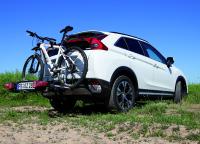 E-Bikes komfortabel transportieren und unterwegs laden: Mitsubishi bietet ideale Lösung für alle Fahrradenthusiasten