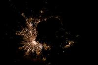 Tracking cities at night from the Space Station