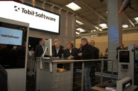 Entspannte Kanzlerin auf dem CeBIT-Messestand von Tobit Software