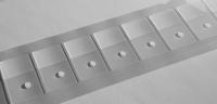 Nichtklebende Stanzteile auf Rollen konfektionieren mit dem Applikationsklebeband von CMC Klebetechnik