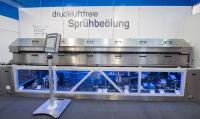 technotrans zeigt druckluftfreie Sprühbeölung im Großformat für den Karosseriebau
