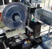 Null-Fehler-Toleranz: HD-Kamera überwacht Tape & Reel von ICs an PSV 7000 von Data I/O / V-Tek Gurtsystem