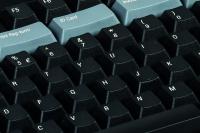 How can I effectively clean and disinfect my keyboard in times of COVID-19?