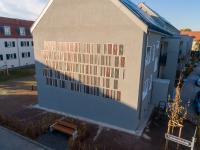 The first thermal insulation composite system with integrated photovoltaics