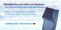 Hochwertige Wickeldecke und Regencape begleiten Rollstuhlfahrer optimal durch die kalte und nasse Jahreszeit