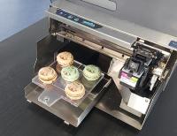 Manual Feed Allows for Eddie to Print on Larger Food Items