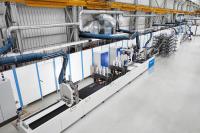 Mehr Leichtigkeit beim Bauen mit Beton: KraussMaffei erweitert Technikum um Rebar-Pultrusions-Anlage