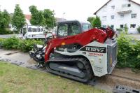 Glasfaserkabelverlegung mit Laderaupe