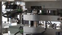 Efficient production of plastic-metal hybrids on turntable injection moulding machines