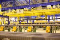Einbindung automatisierter Schwerlast-Fördertechnik in die Produktion durch MES