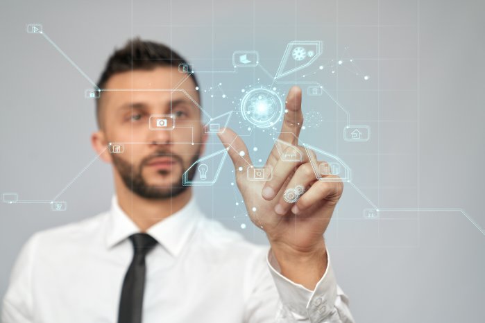 concentrated-businessman-clicking-virtual-3d-icon.jpg