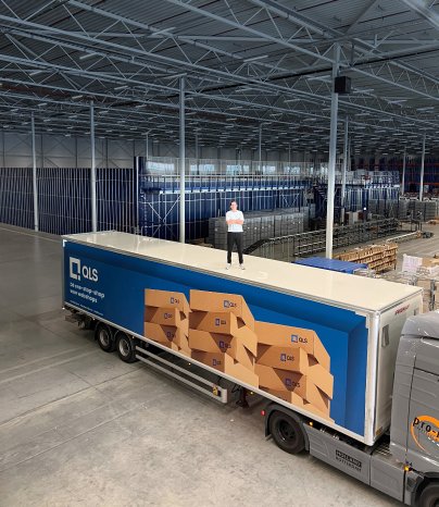 QLS CEO Quincy Boogers on top of truck in FC2.jpg