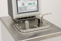 JULABO expands its range of accessories for circulators with a lockable bath cover. The bath cover is particularly useful if the user maintains high to very high temperatures (> 150 °C) over a long period of time.