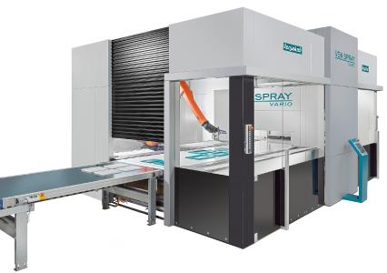 Coating surfaces and edges in one pass - the Ven Spray Vario spray coating machine with inte-grated coating robot and four spray guns for the surface / Photo: Copyright Venjakob