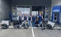 Als eines der ersten mit den neuen E-Bikes von Mocci ausgestattet: das Team vom TÜV SÜD Service Center in Heidelberg Als eines der ersten mit den neuen E-Bikes von Mocci ausgestattet: das Team vom TÜV SÜD Service Center in Heidelberg