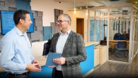 Frank Wolters from Arvato Systems and Martin Kreutz from Stadtwerke Wolfhagen in conversation