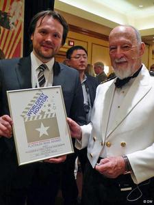 Mikko Stübner-Lankuttis (l) received the awards at WorldFest Houston 2013 on behalf of all DW winners