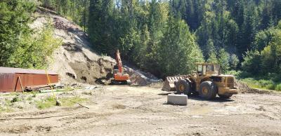 Photo of start of excavation using excavator and loader