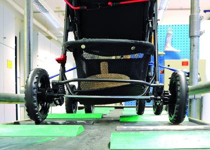 Prüfung von Kinderwagen