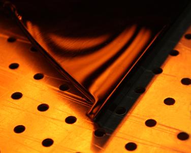 Highly polished plastic surfaces are achieved with UV lacquers, whose curing is improved with the aid of infrared. Copyright Heraeus Noblelight 2012