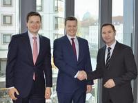 Signing the contract at the Berlin offices of gematik