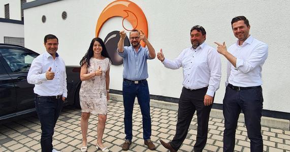 Gruppen Bild Vodafone und Epsilon: v.l.n.r. Dimitrios Nikolaidis (Vertriebsleiter Epsilon Telecom), Karin Lia Temmen (Vodafone), Christian Krug (Geschäftsführer Epsilon Telecom), Martin Schreiterer (Vodafone), Hendrik Baumgarten (Vodafone)