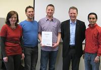 Ivo Hirseland und Achim Hager (dritter und vierter v. links) im Kreise von Kollegen 