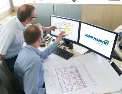 Konstruktiver Austausch im WTB-Team während des Planungsprozesses
