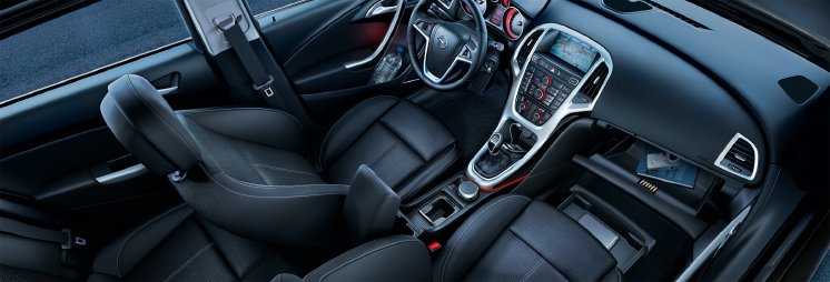 Erstmals im Astra befindet sich unter dem Beifahrersitz optional ein geschlossenes Schubfac.jpg