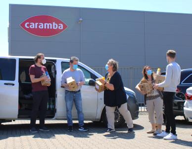 Die Mitarbeiter von Immersatt freuten sich über Caramba Produkte. Foto: Caramba