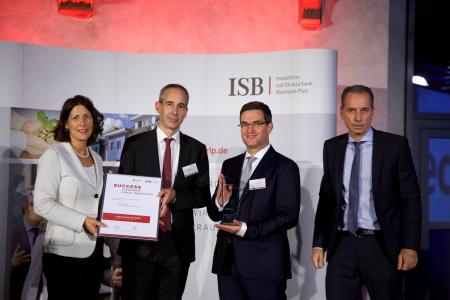 Von links nach rechts: Wirtschaftsstaatssekretärin Daniela Schmitt, Gerald Richter (ECOS), Paul Marx (ECOS), Dr. Ulrich Link (Mitglied des Vorstand der ISB)