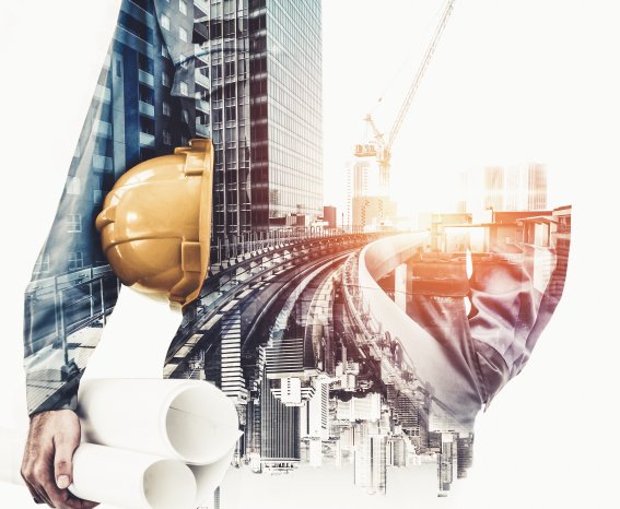 Person_Planer_BauplÃ¤ne_Helm_Stadt_GebÃ¤ude_Bahnhof_Baustelle_iStock-1185806208.png