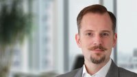 Dr. Alexander Swienty präsentiert KI-Agenten für automatisierte P2P-Prozesse auf dem E-Rechnungsgipfel.