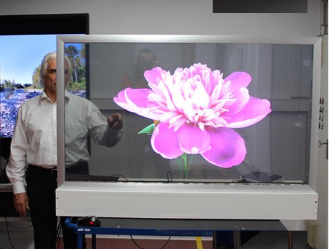 An OLED screen made from an incredibly fine mesh embedded in the glass  turns into a transparent TV : r/nextfuckinglevel