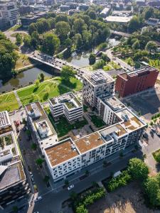 Unter dem Innenhof des beeindruckenden Bebauungsblocks J befindet sich die Tiefgarage mit WÖHR Combilift 542 und Parklift 405 Systemen für insgesamt 143 Stellplätze.