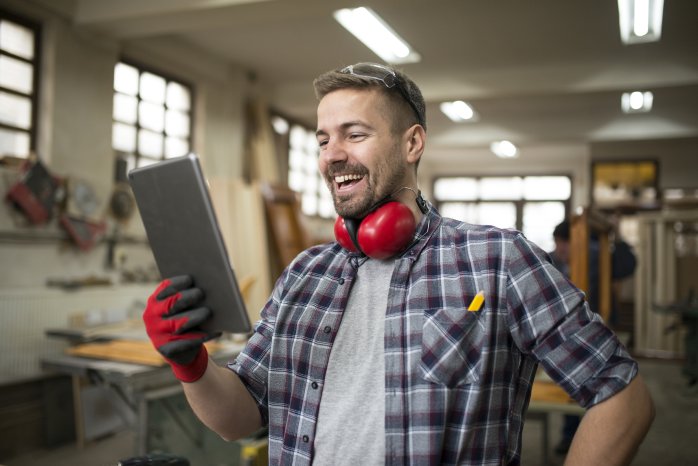 professional-woodworker-using-tablet-carpentry-workshop.jpg