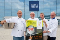 The Swedish chefs cheerfully wet our appetites at the IKA/Culinary Olympics 2012 in Erfurt; f.l.t.r.: Joachim Mueller, Kurt Weid (Team Manager of the Swedish community catering team and President of the Swedish Chefs' Association), Niklas Edgren, Jürgen Mogge (sous-chef at Hotel Tanne, Ilmenau); Source: Messe Erfurt