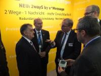Innenminister NRW bei e*Message PMRExpo2017: Minister Herbert Reul, Andreas Gegenfurtner, Dr Dietmar Gollnick (v.l.n.r.) / Foto: Copyright eMessage