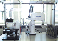 The Robotic Image Analysis System (ROBIAS) is built from a electricpowered microscope and an optional robotic slide feeder