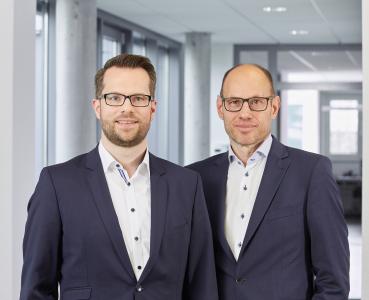 Daniel Seiler (Managing Director of IDS) and Jürgen Hartmann (Founder, Owner, and Managing Director of IDS) (© IDS Imaging Development Systems GmbH)