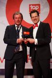 Siegfried Bloch (left), Vice President of Human Resources at arvato Systems, accepts the award from David Plink, CEO Top Employers Institute