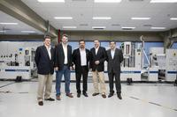 Franz Freiherr von Fürstenberg, Christoph Blank, Reginaldo Soares Damasceno, Roman Herold und Ricardo Raimundo (von links) nach der erfolgreichen Vorführung der FormerLine von manroland web systems vor den brasilianischen Kunden / © manroland web systems