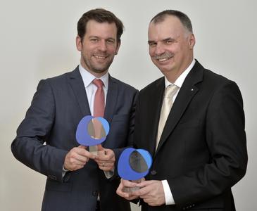 The ALTANA Innovation Award 2013 goes to the winner team of ACTEGA Terra: Timo Kondziela (left) and Frank Kamphuis (right) received the award in Wesel, also on behalf of Tim Kammer and Marcel Altenburg