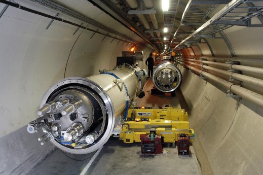 Quadrupole unit being placed in LHC tunnel2.JPG