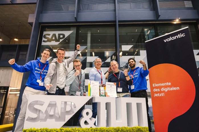 valantic-hackathon-2025-winning-team-coop-with-coaches.jpg