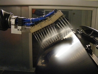 The CO2 cleaning system is fitted with three nozzle arrays which are turned on and off via the robot controls to ensure economical operation. Each array has five cleaning heads designed with supersonic two-component ring nozzles