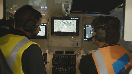 Vanja Videnovic [Breaker] and Lachlan Watson [RDA] in Boxer training simulator.png