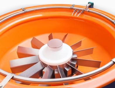 The work bowl of the "CM" rotary vibrator. The shown work piece is a dummy / Copyright: Walther Trowal
